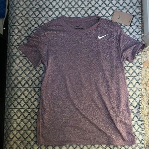 Purple Nike Dri-FIT t-shirt.